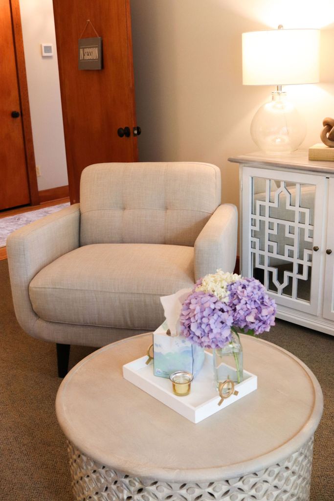 Serene therapist office showcasing a comfortable chair.